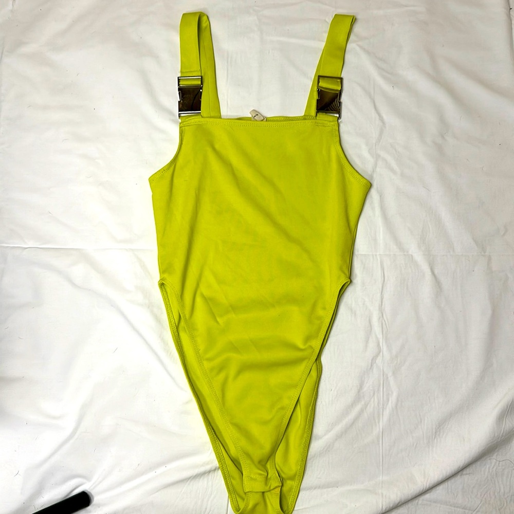 Neon yellow body suit